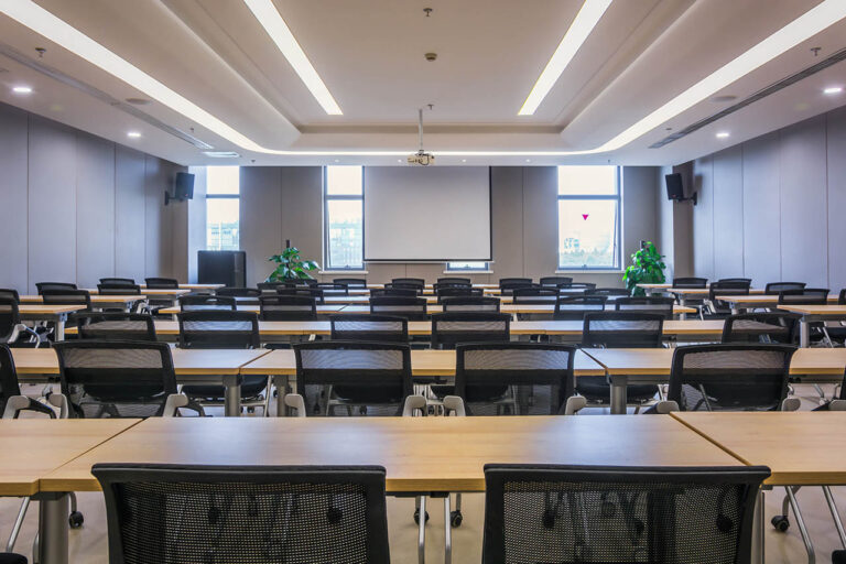 Colorful seats in an empty lecture hall.